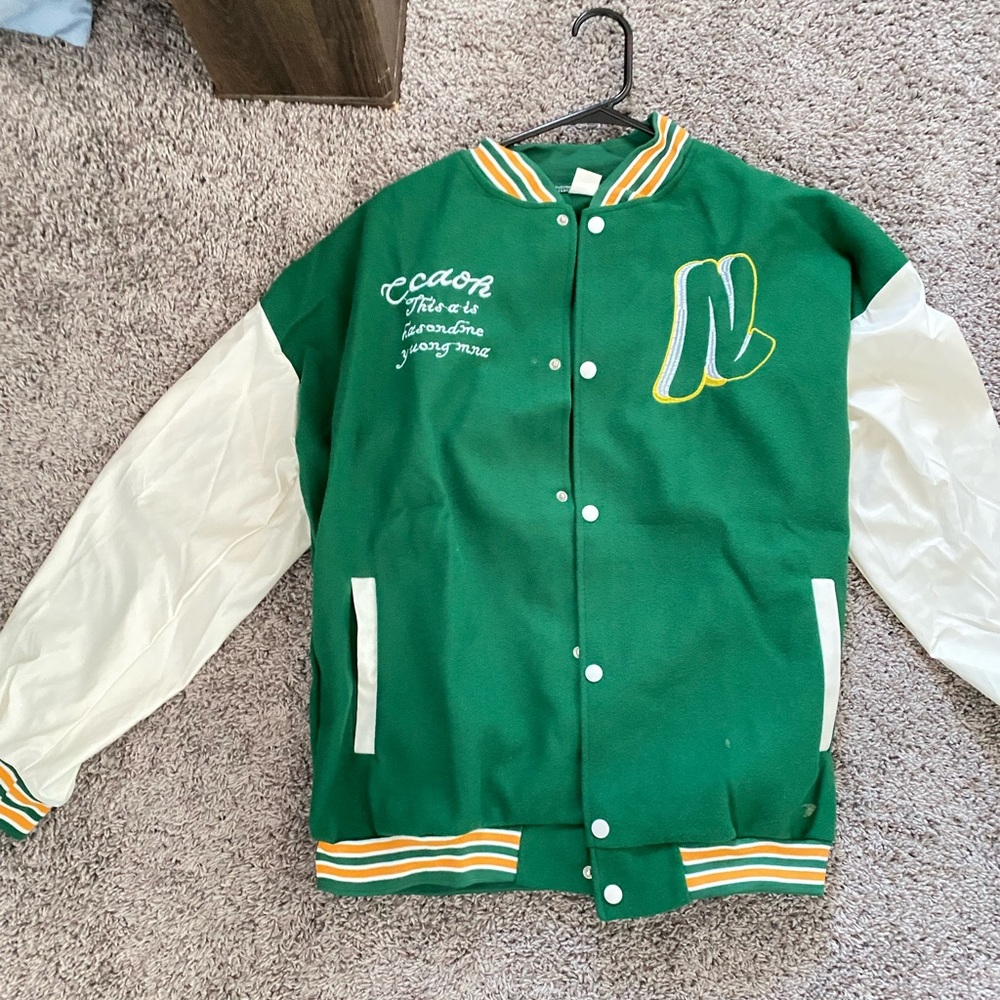 Green varsity jacket